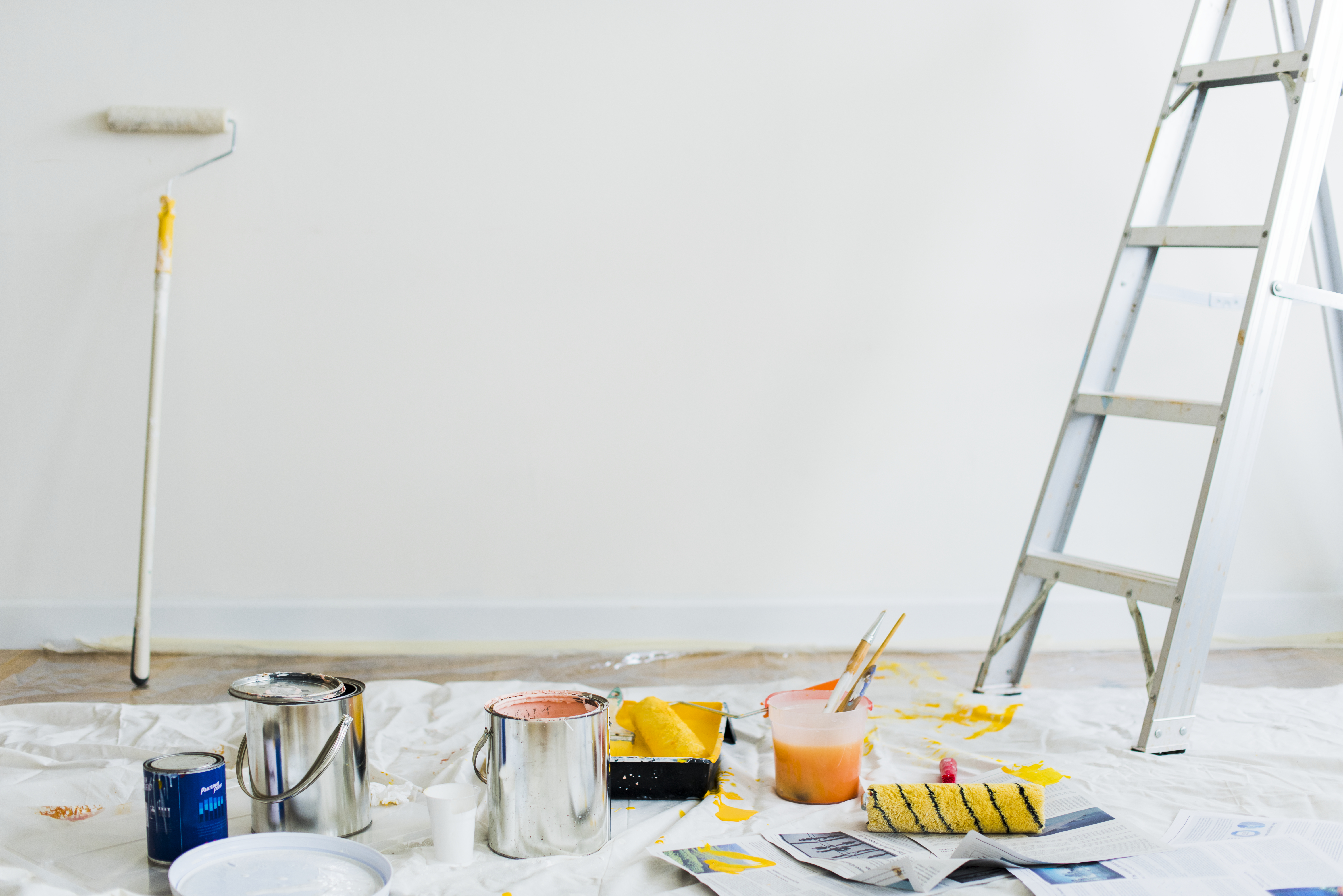 Painter painting a wall